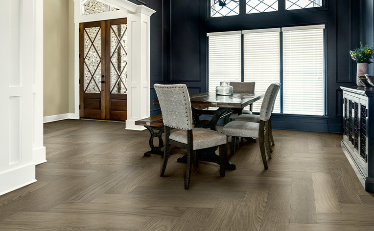 herringbone hardwood flooring in dining room